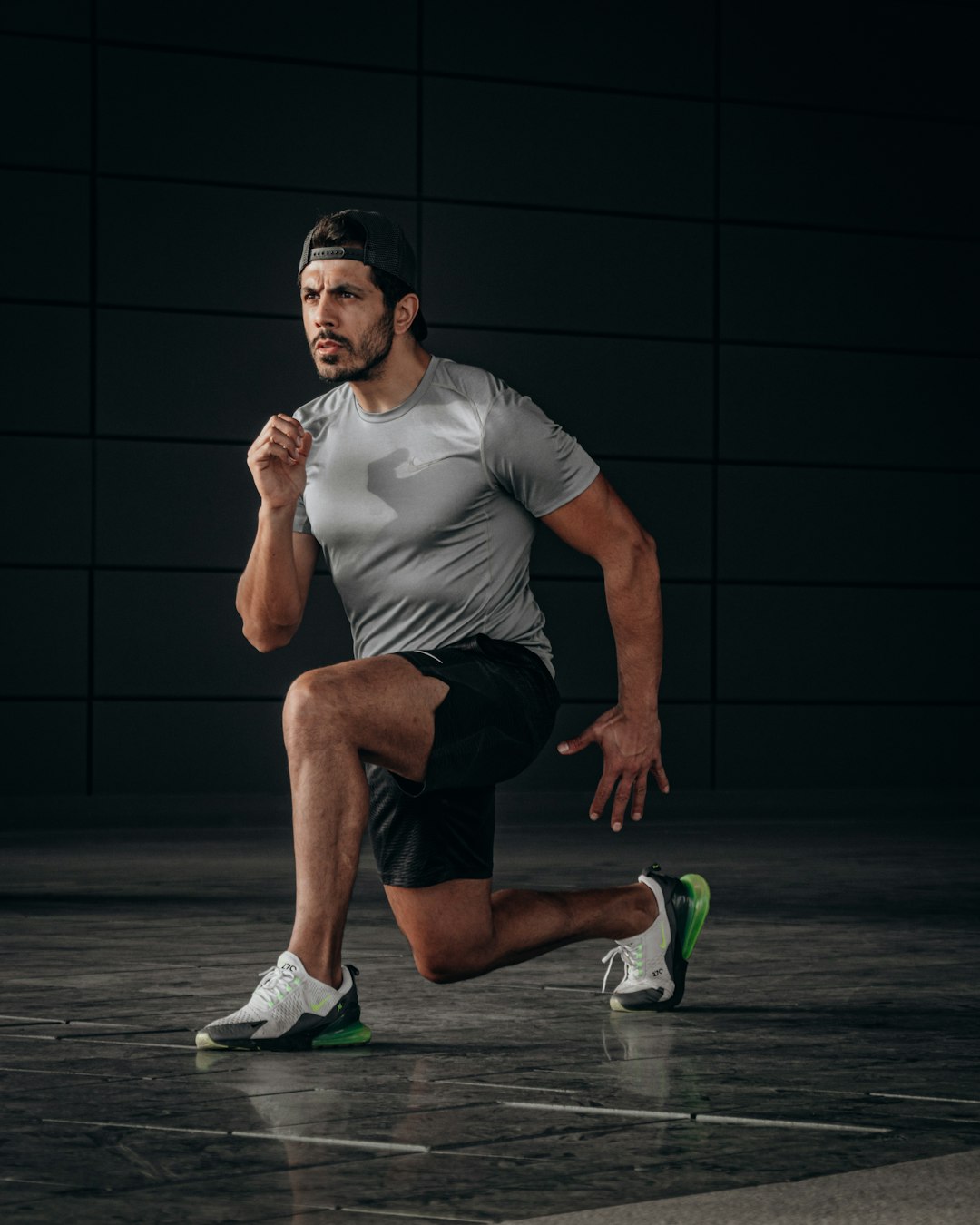 hero-img man-in-white-crew-neck-t-shirt-and-black-shorts-sitting-on-floor-qzp60ft380e